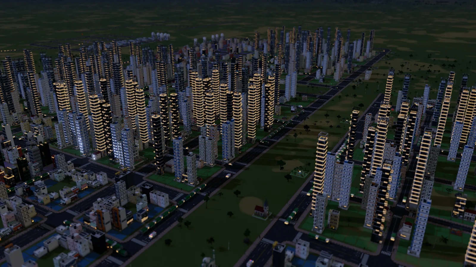 Dream City at night: apartment towers with lit windows across a large city