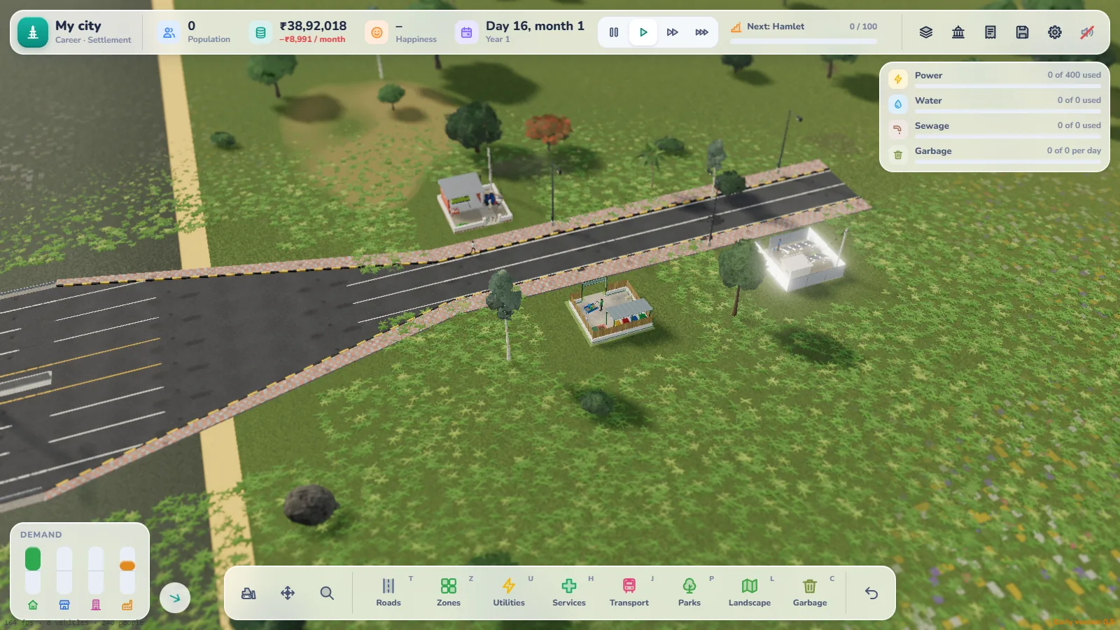A young Dream City settlement by the highway, with a diesel generator shed, a solar mini-grid and a garbage point next to the first road